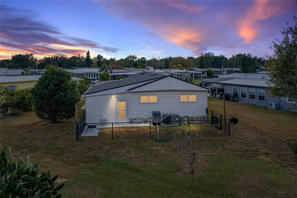 1610 Reynolds Road, Unit 72 Lakeland, FL 33801 - Photo 23 of 25 a view of a house with a yard porch and sitting area