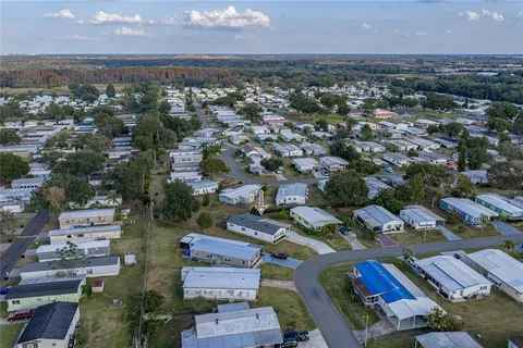 an aerial view of a city with lots of residential buildings
