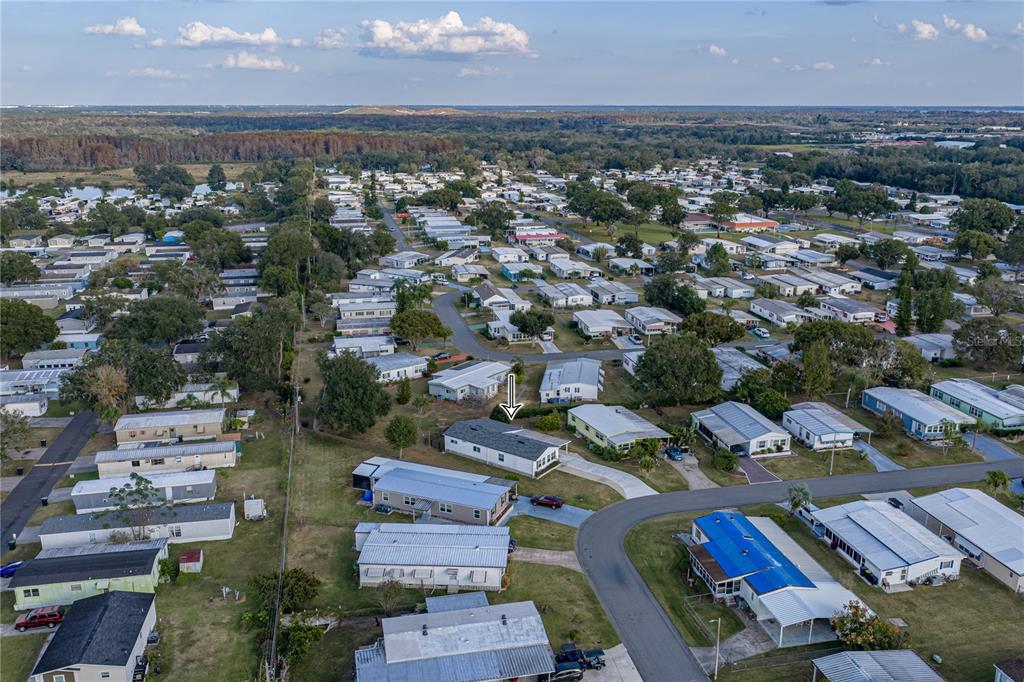 1610 Reynolds Road, Unit 72 Lakeland, FL 33801 - Photo 24 of 25 an aerial view of a city with lots of residential buildings