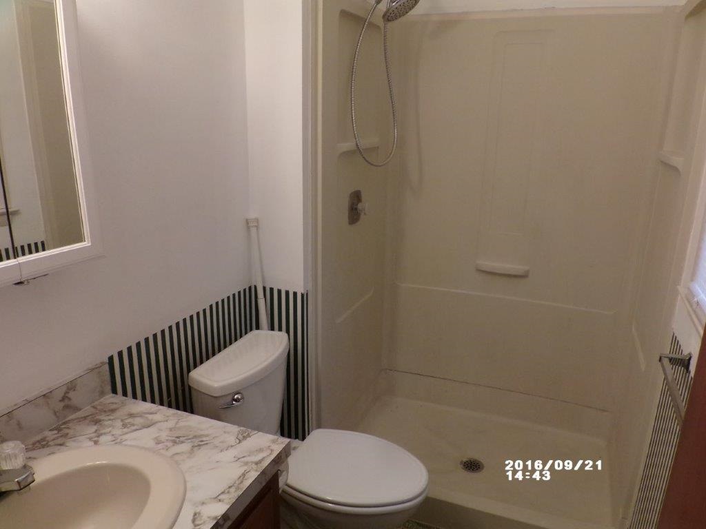 79 Chestnut Ridge Road Staunton, VA 24401 - Photo 13 of 24 a bathroom with a toilet and a sink