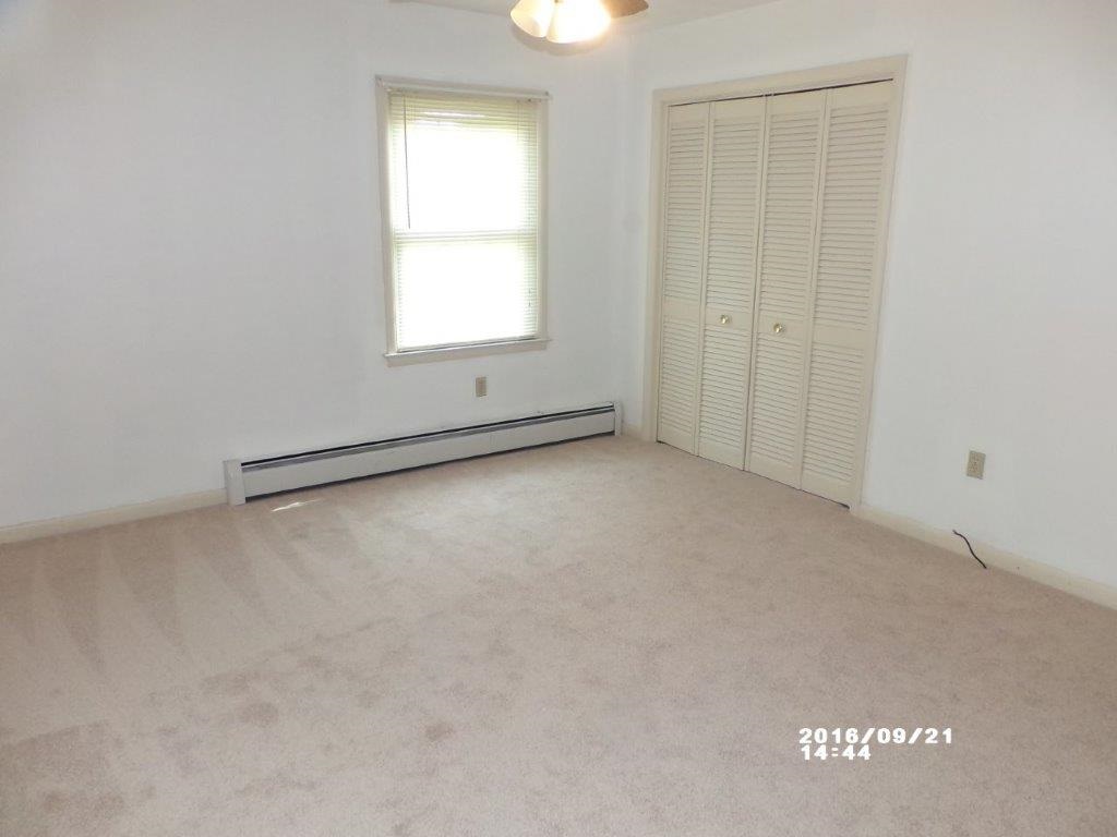 79 Chestnut Ridge Road Staunton, VA 24401 - Photo 17 of 24 a view of an empty room with a window