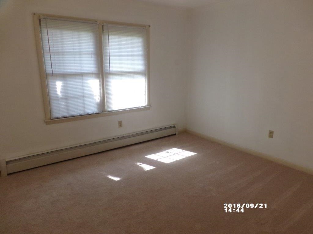 79 Chestnut Ridge Road Staunton, VA 24401 - Photo 19 of 24 an empty room with a window