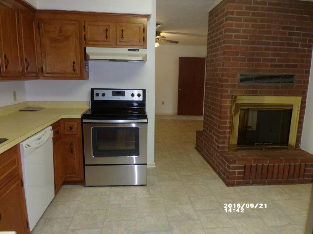 79 Chestnut Ridge Road Staunton, VA 24401 - Photo 9 of 24 a kitchen with a stove and cabinets