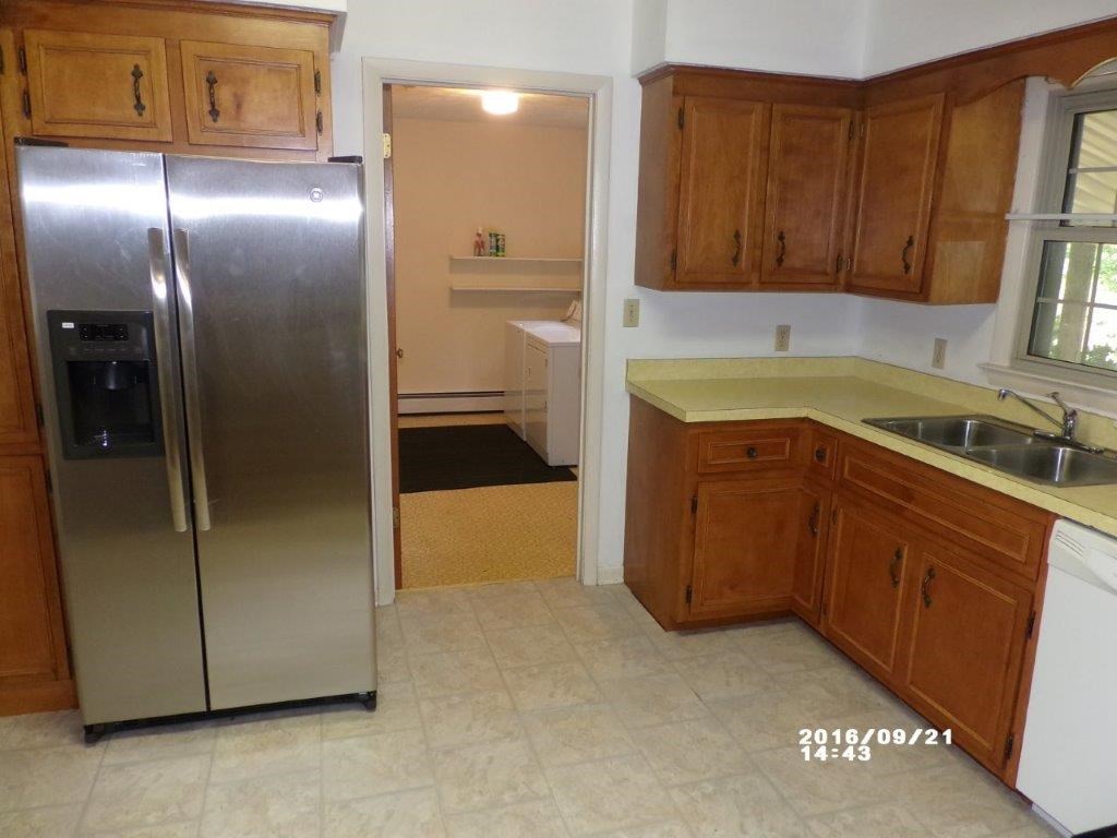 79 Chestnut Ridge Road Staunton, VA 24401 - Photo 10 of 24 a kitchen with stainless steel appliances granite countertop a refrigerator and a sink