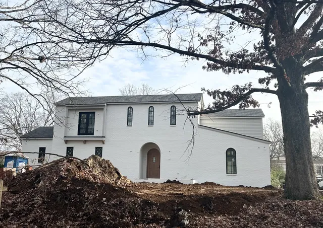 a house view with a outdoor space
