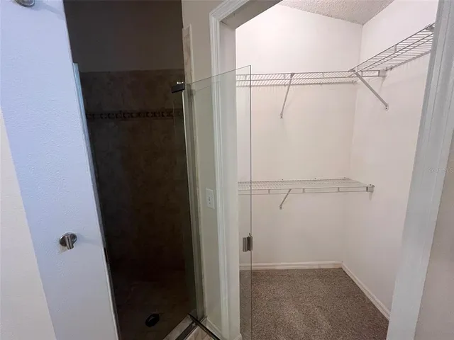 a view of an empty walk in closet