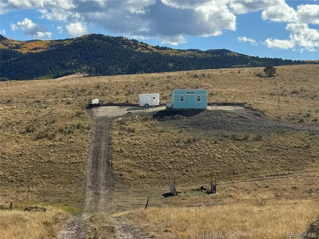 a view of a house with a ocean beach
