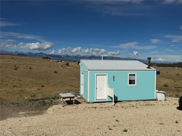 a view of a ocean beach and a building
