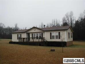 5536 Stack Road Monroe, NC 28112 - Photo 1 of 8 a view of a house with a yard