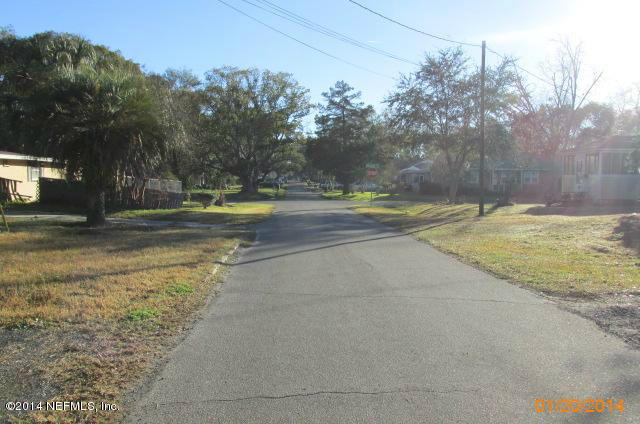 5213 Sunderland Road Jacksonville, FL 32210 - Photo 5 of 6 a view of a yard with large trees