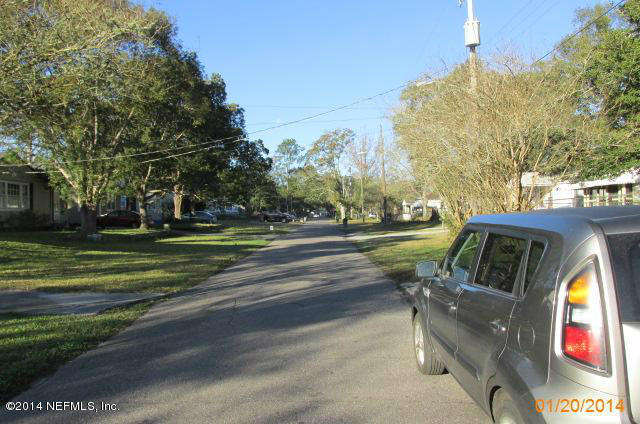 5213 Sunderland Road Jacksonville, FL 32210 - Photo 6 of 6 a view of a park with swings and slides