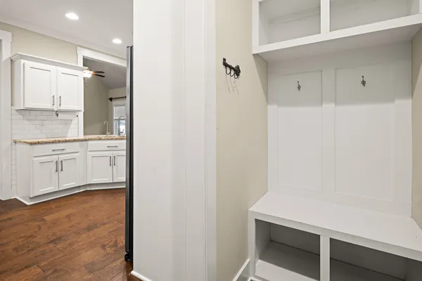 a bathroom with a shower and toilet