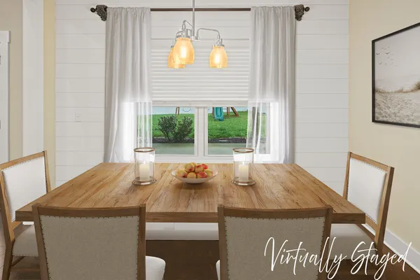 en empty room with windows and chandelier fan