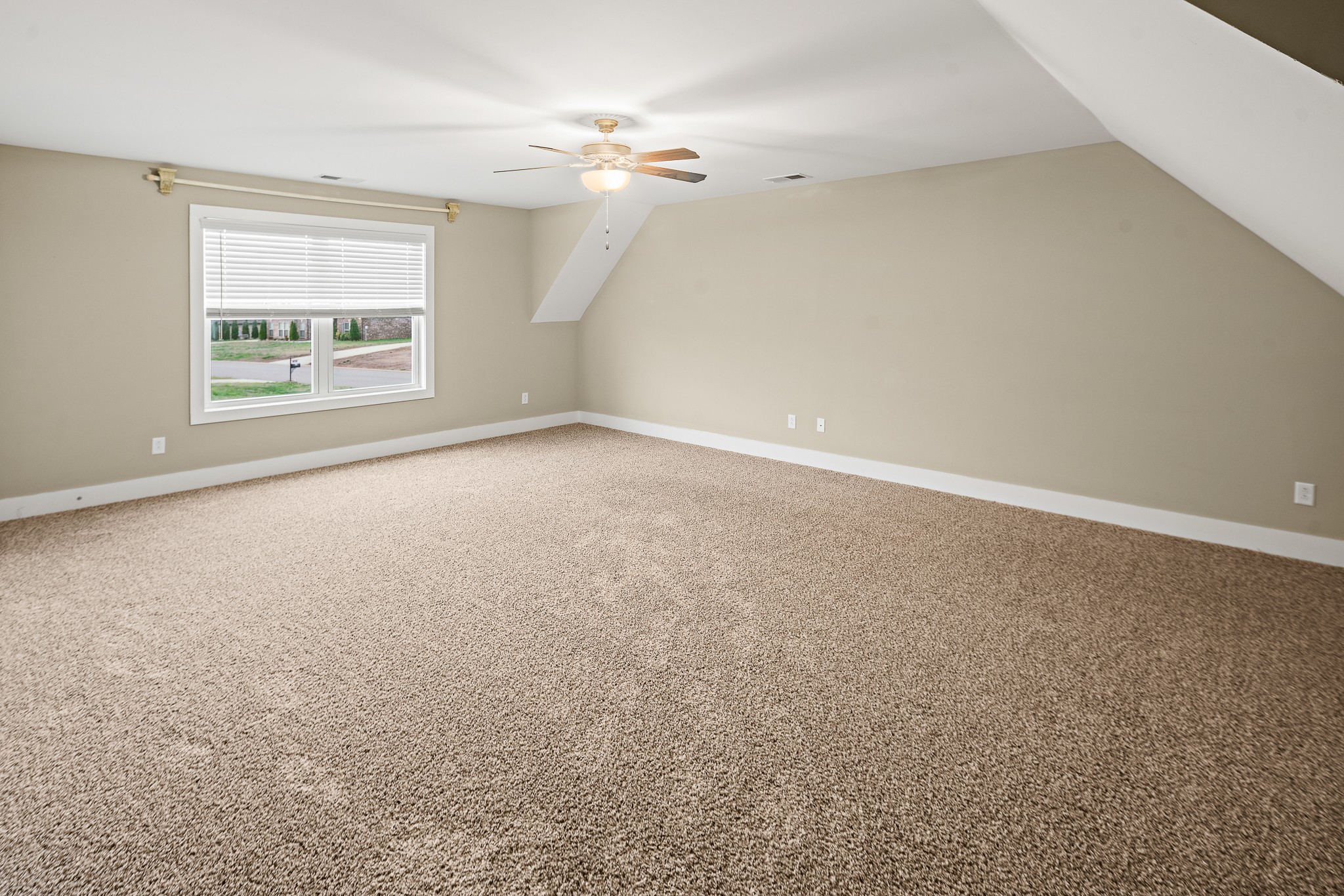 1105 Pegasus Run Lascassas, TN 37085 - Photo 27 of 48 en empty room with windows and chandelier fan
