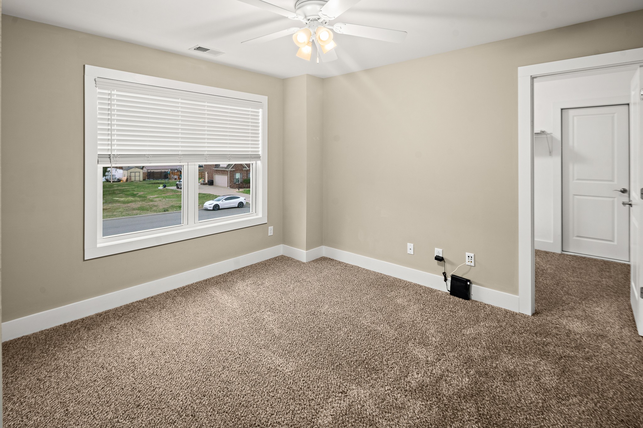 1105 Pegasus Run Lascassas, TN 37085 - Photo 29 of 48 an empty room with a window and a fan