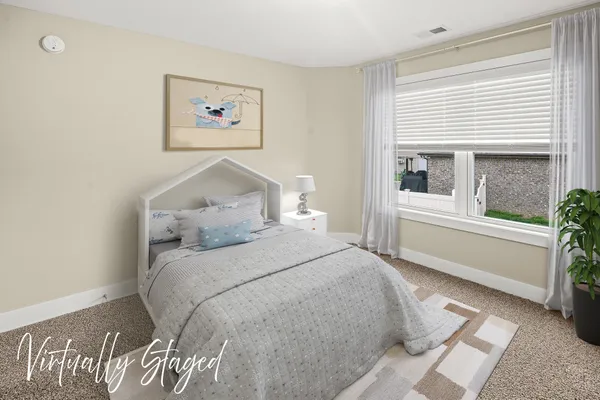 a view of an house with backyard space and garden