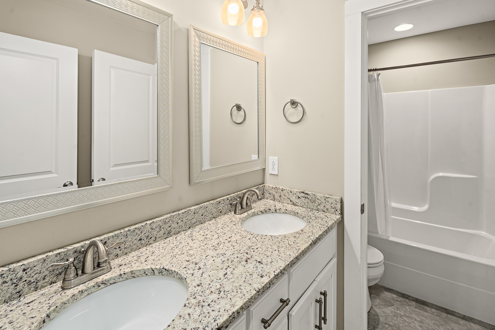 1105 Pegasus Run Lascassas, TN 37085 - Photo 33 of 48 a bathroom with a granite countertop sink a toilet and shower