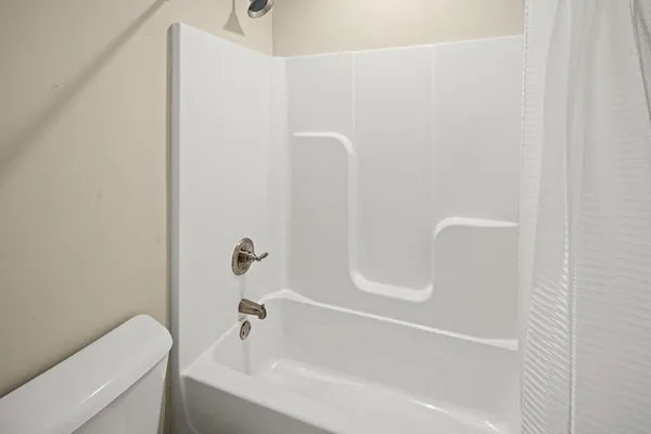 a front view of a house with white door