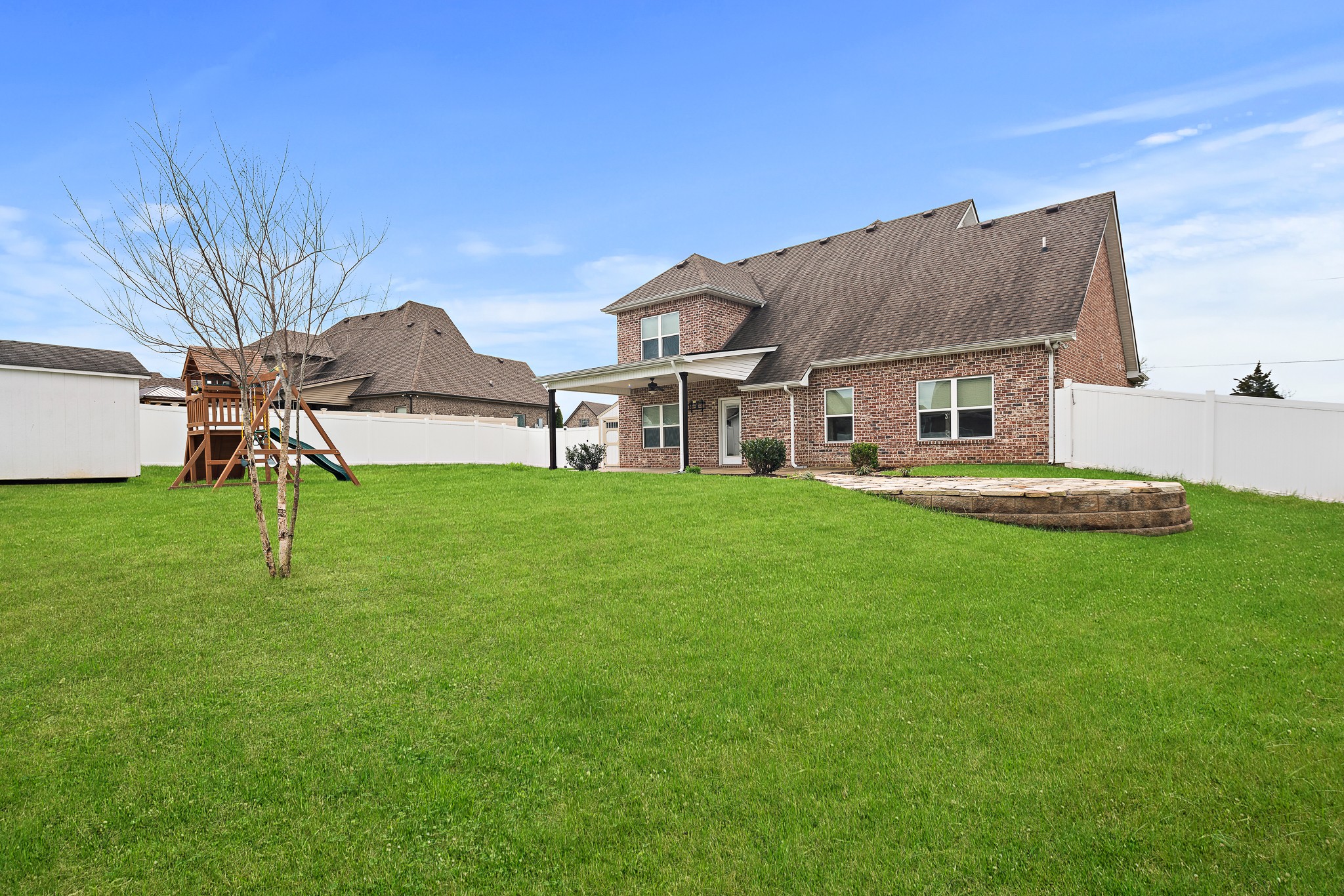 1105 Pegasus Run Lascassas, TN 37085 - Photo 44 of 48 a view of a house with a backyard