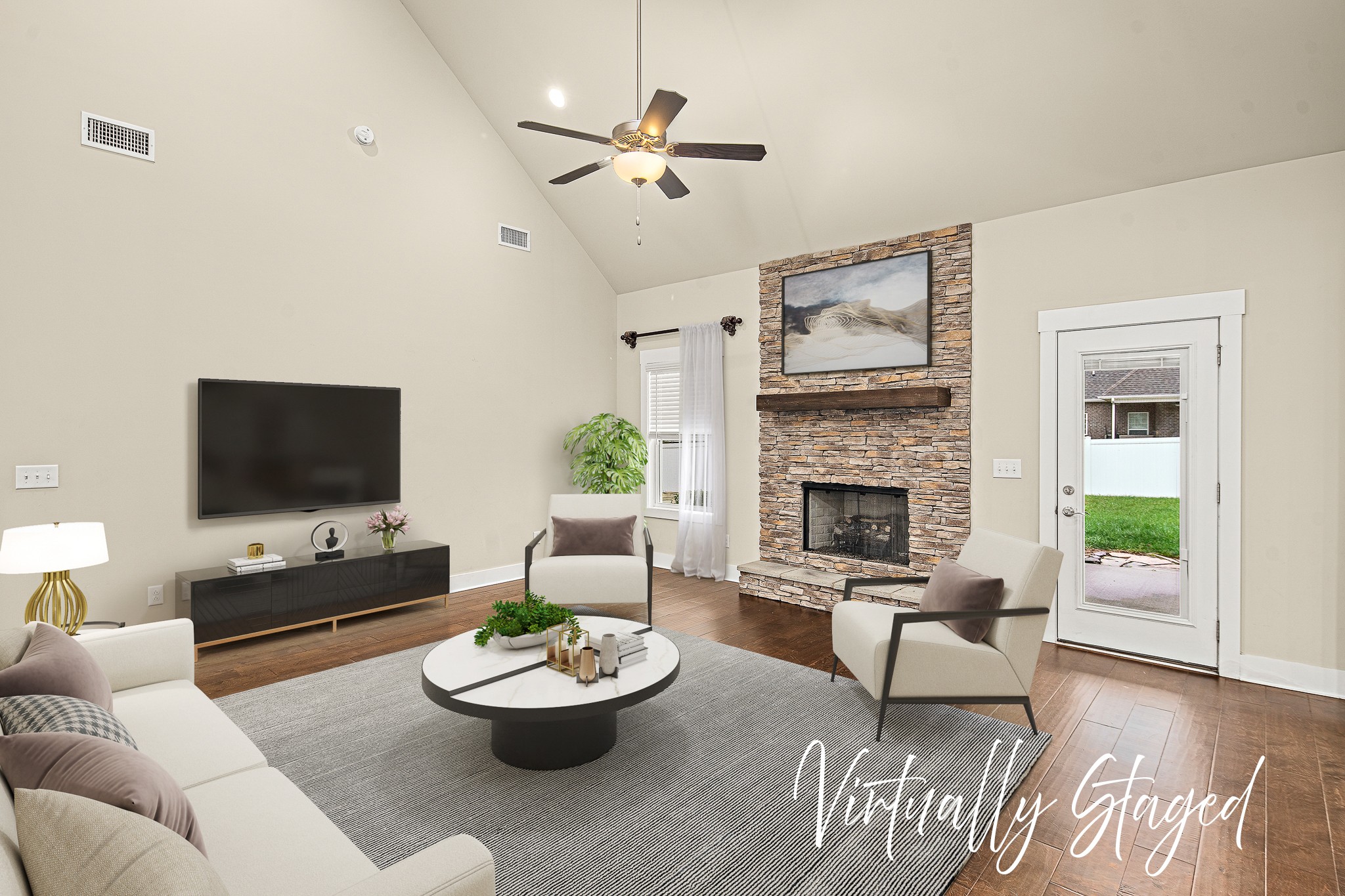 1105 Pegasus Run Lascassas, TN 37085 - Photo 7 of 48 a living room with furniture a fireplace and a flat screen tv