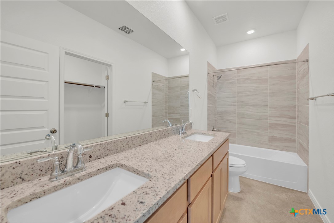 2925 Quail Rdg Lane Temple, TX 76501 - Photo 10 of 16 Please Note: These interior photos are not of the actual home but are of a completed one with a similar floor plan. Finishes, features, and layouts may vary.