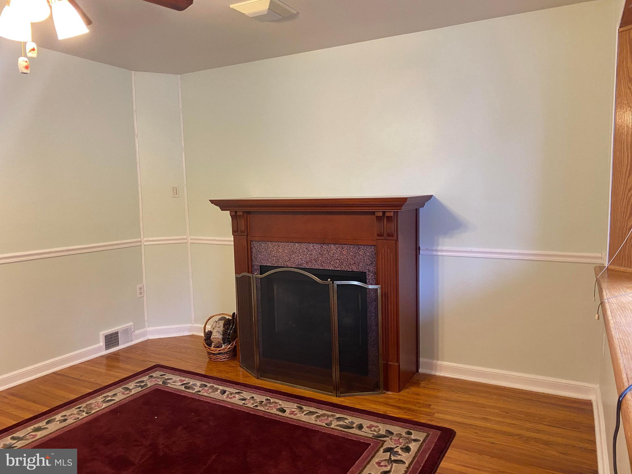 1827 Fuller Street Philadelphia, PA 19152 - Photo 5 of 36 Living Room- Free Standing Gas Fireplace