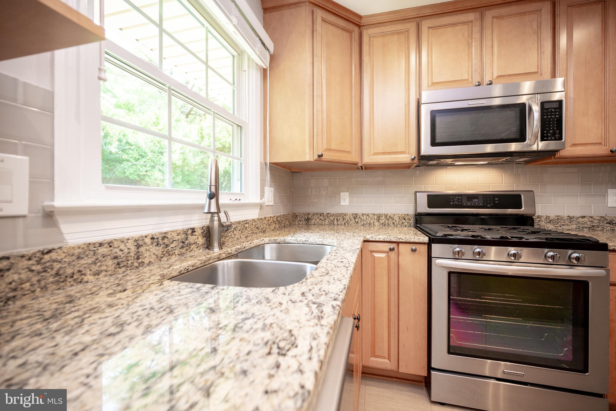 4533 Gilbertson Road Fairfax, VA 22032 - Photo 9 of 56 Granite Counters, Stainless Steel Appliances