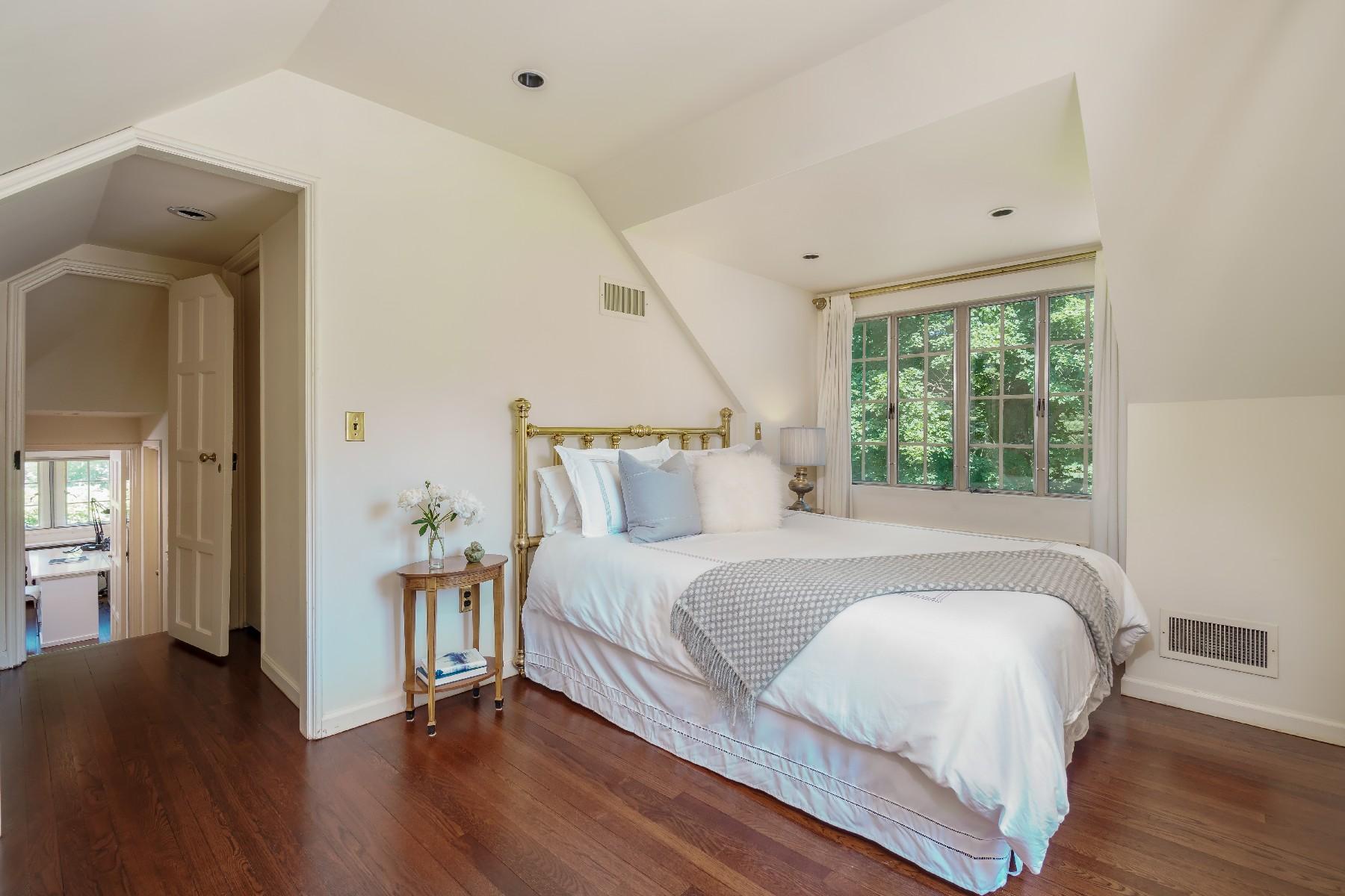 42 Old Farm Road Darien, CT 06820 - Photo 33 of 35 a bedroom with a bed and a large window