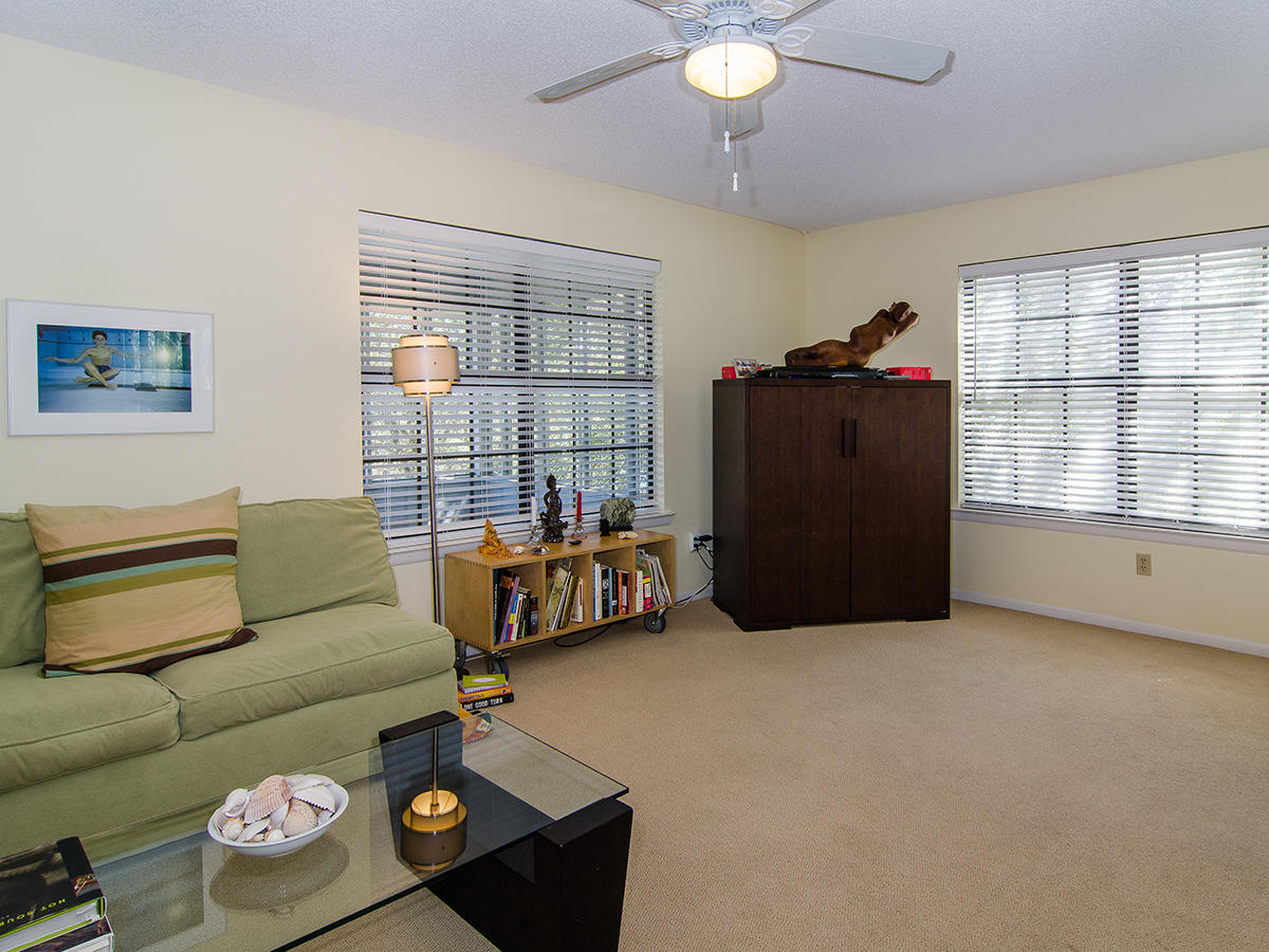 111 B Blue Lake Road Santa Rosa Beach, FL 32459 - Photo 24 of 34 a living room with furniture and a window
