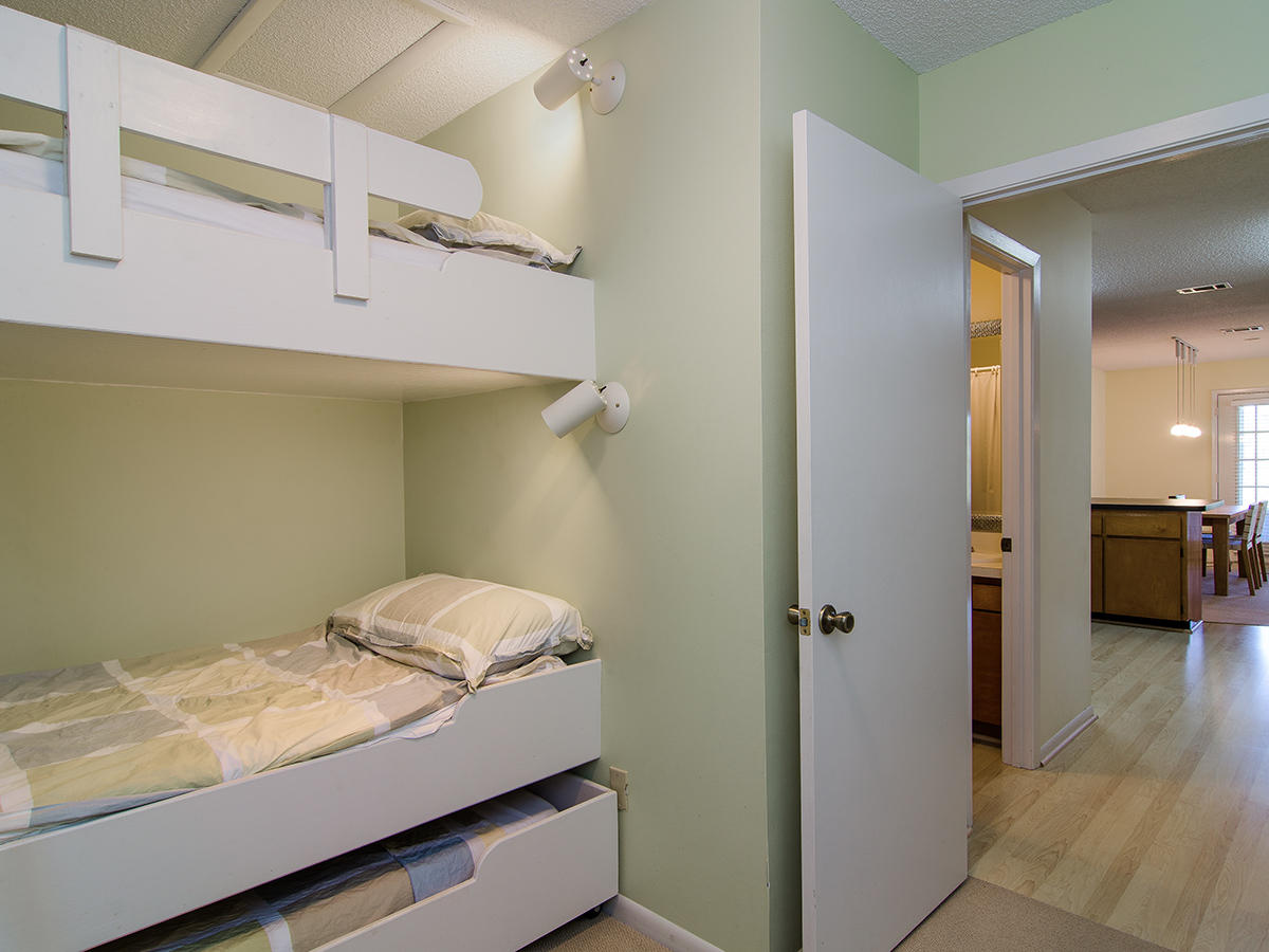 111 B Blue Lake Road Santa Rosa Beach, FL 32459 - Photo 29 of 34 a room with a bed and a view of bathroom