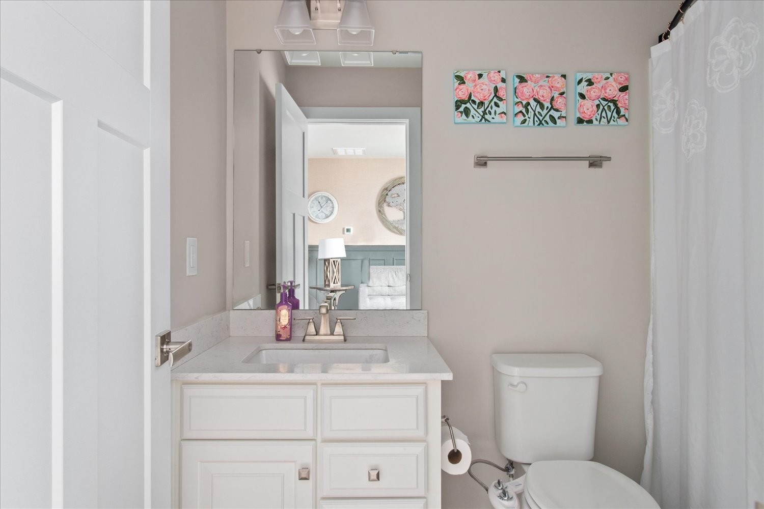 9357 Barco Road Brentwood, TN 37027 - Photo 23 of 29 a bathroom with a sink vanity mirror and toilet