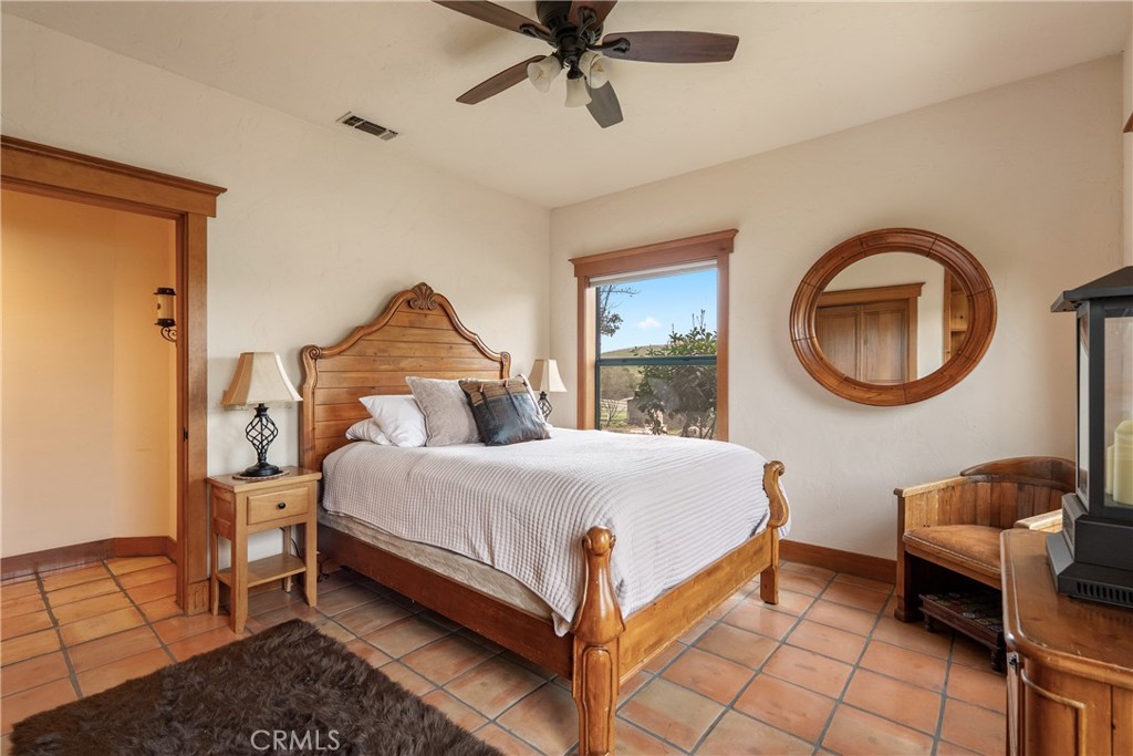 805 Spring Creek Way Templeton, CA 93465 - Photo 28 of 65 a bedroom with a bed and window