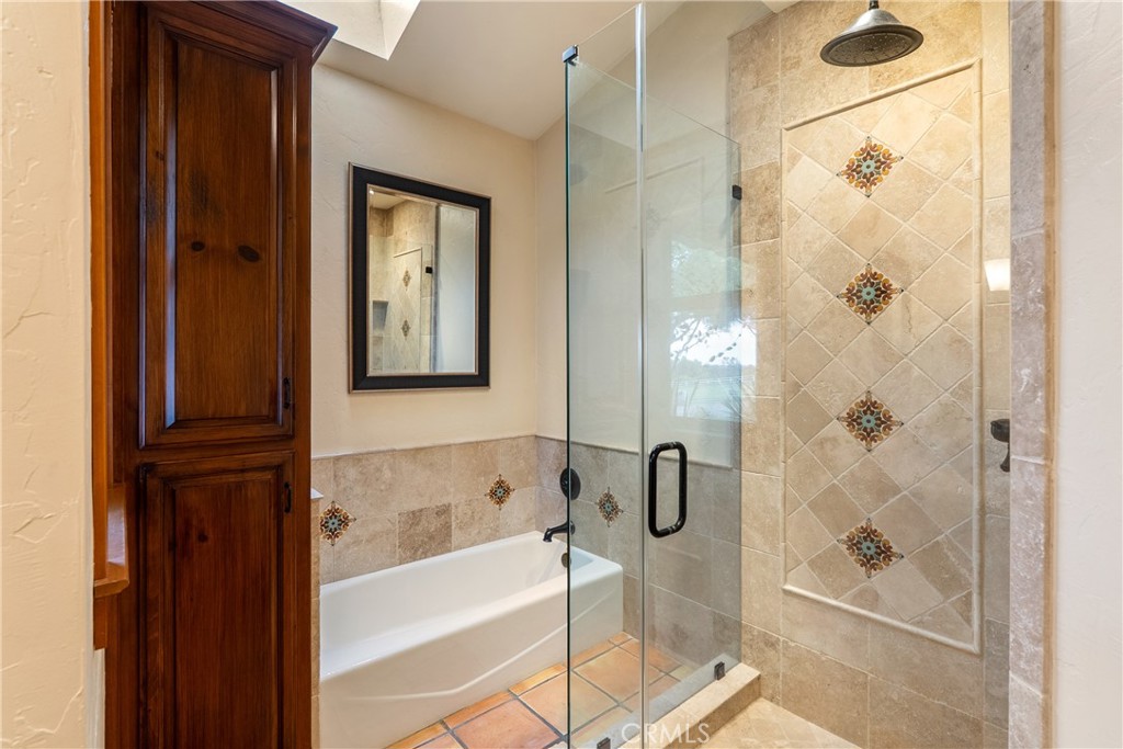 805 Spring Creek Way Templeton, CA 93465 - Photo 30 of 65 a bathroom with a bathtub and shower
