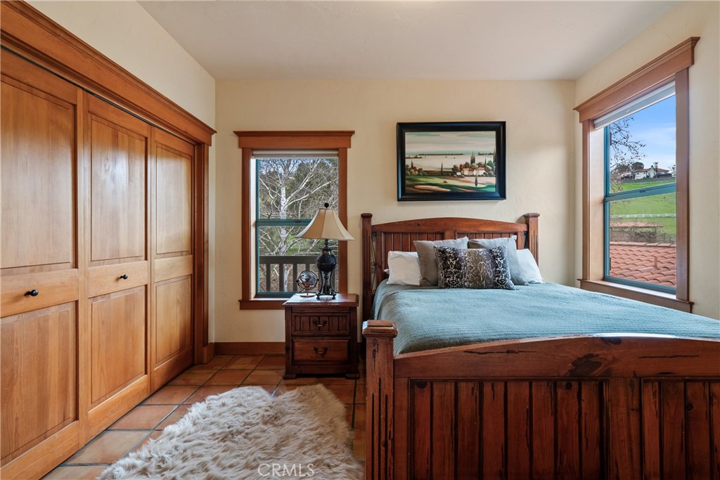 805 Spring Creek Way Templeton, CA 93465 - Photo 35 of 65 a bedroom with furniture and windows