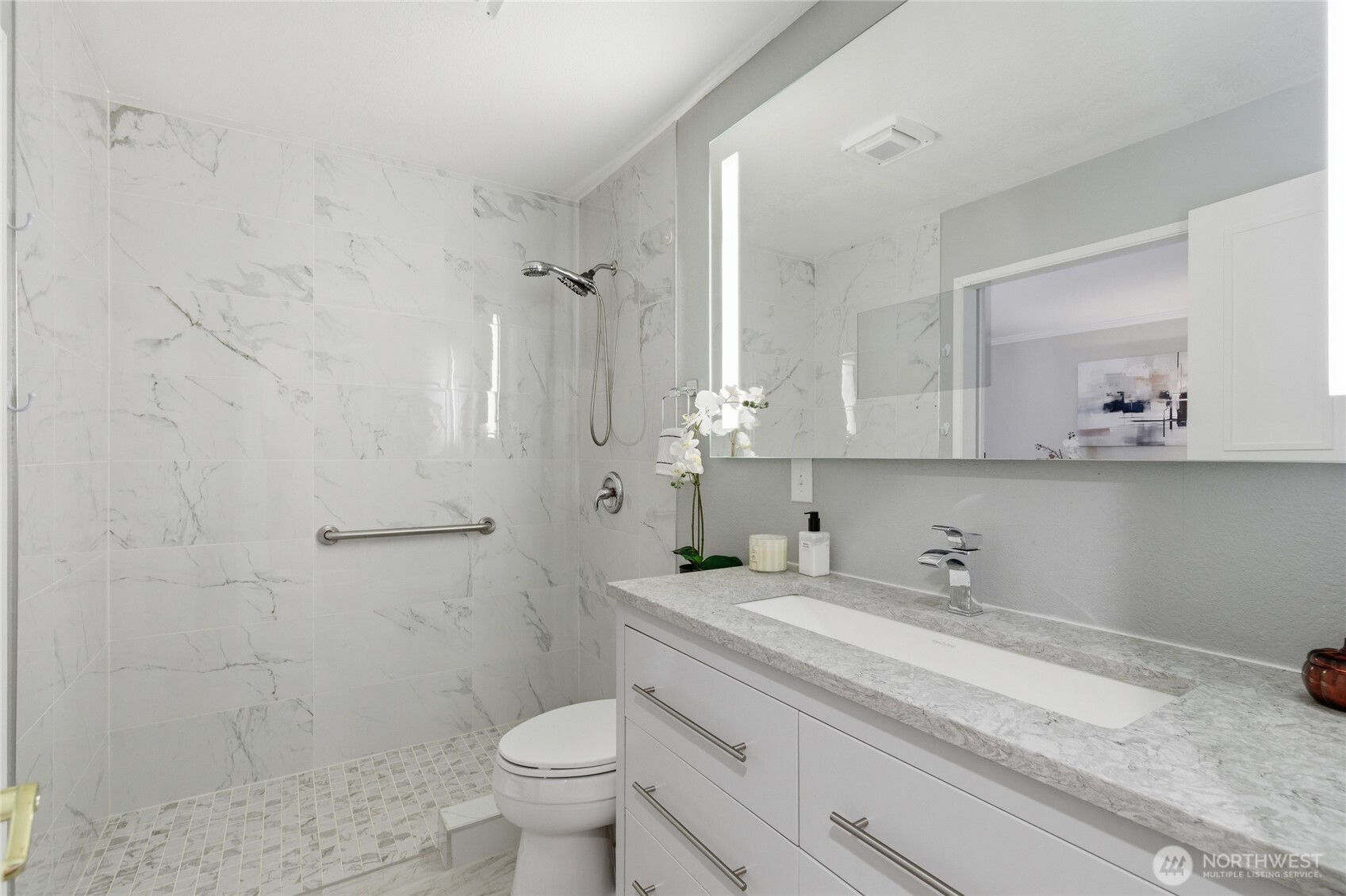 412 164th Place Southeast Bothell, WA 98012 - Photo 17 of 39 a bathroom with a sink toilet and shower