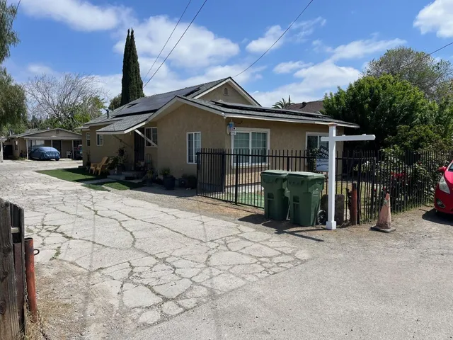 a view of a house with a patio