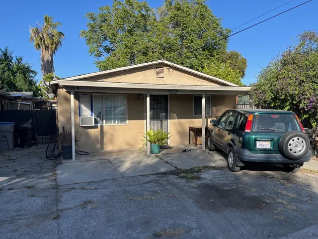 a front view of a house with garage