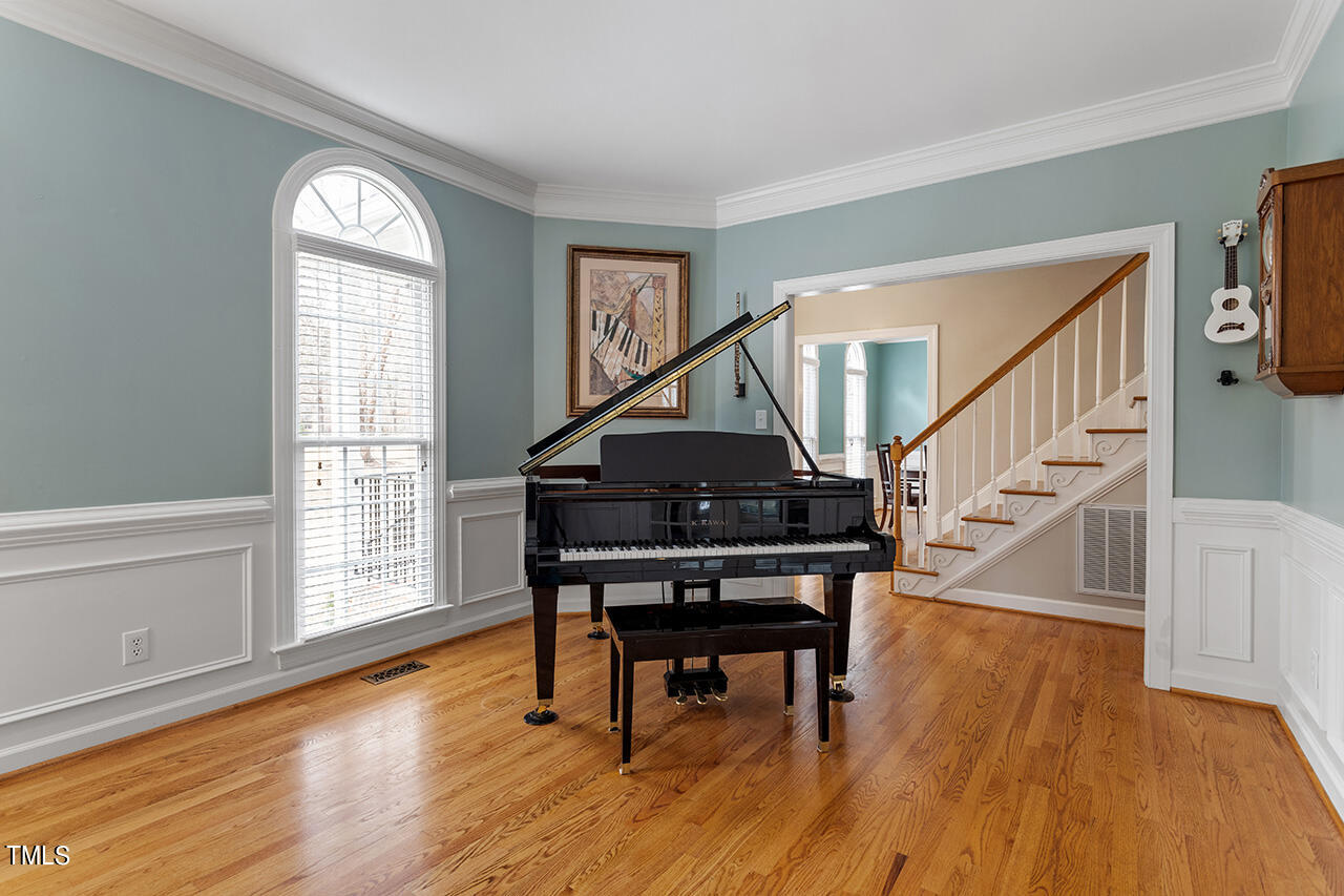 2709 Dray Court Raleigh, NC 27613 - Photo 4 of 51 a living room with furniture and a wooden floor