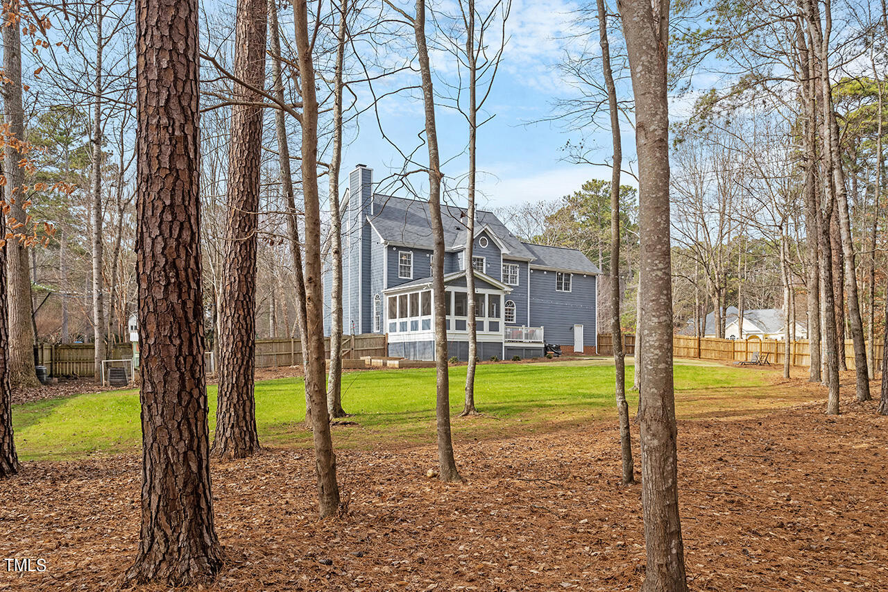 2709 Dray Court Raleigh, NC 27613 - Photo 41 of 51 a view of a house with a yard