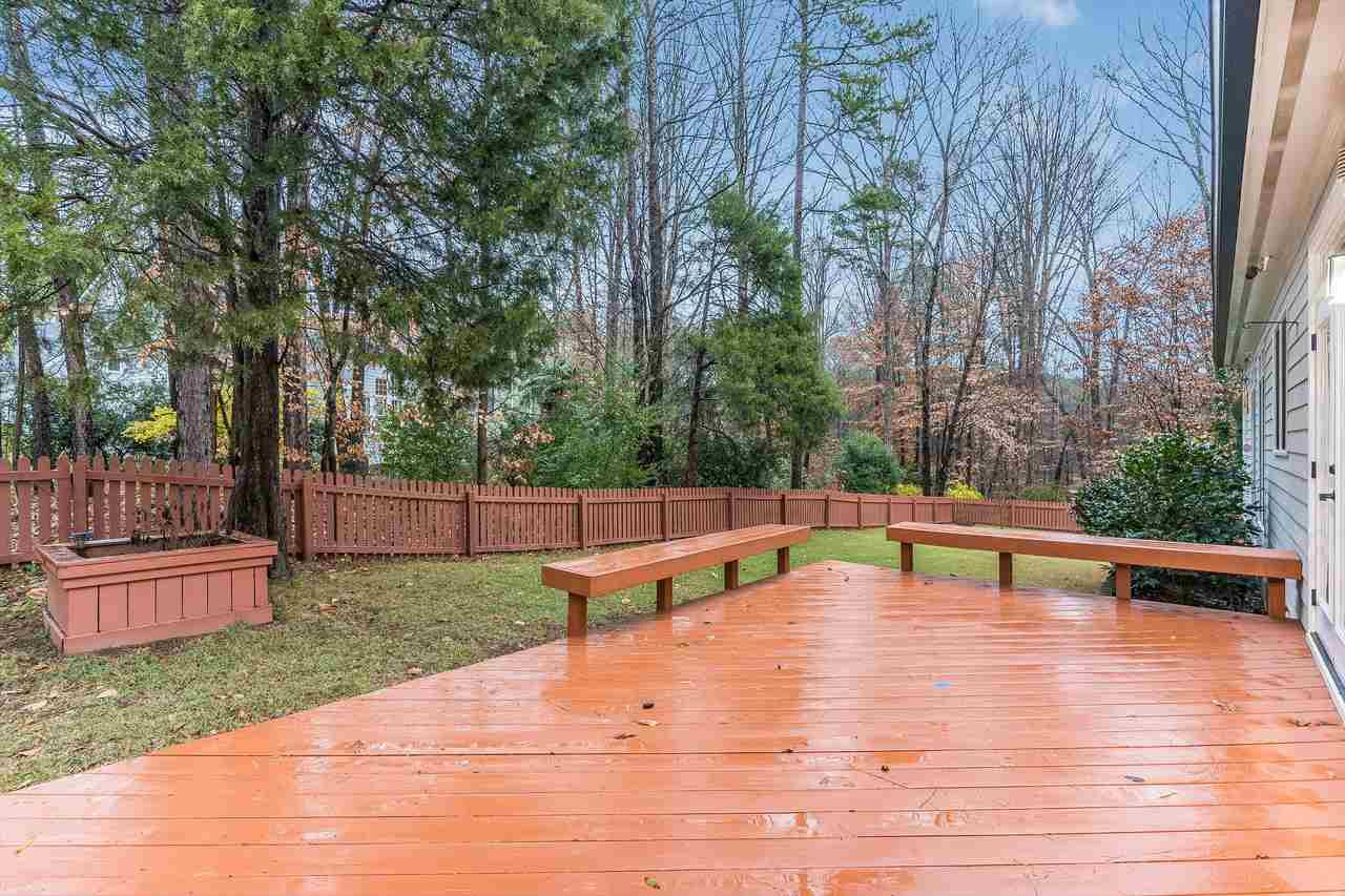 3712 Evander Way Raleigh, NC 27613 - Photo 11 of 13 The yard is FENCED and has this HUGE DECK! Plenty of space to enjoy the outdoors and this is a VERY PRIVATE lot, one of the best in the neighborhood! Deck