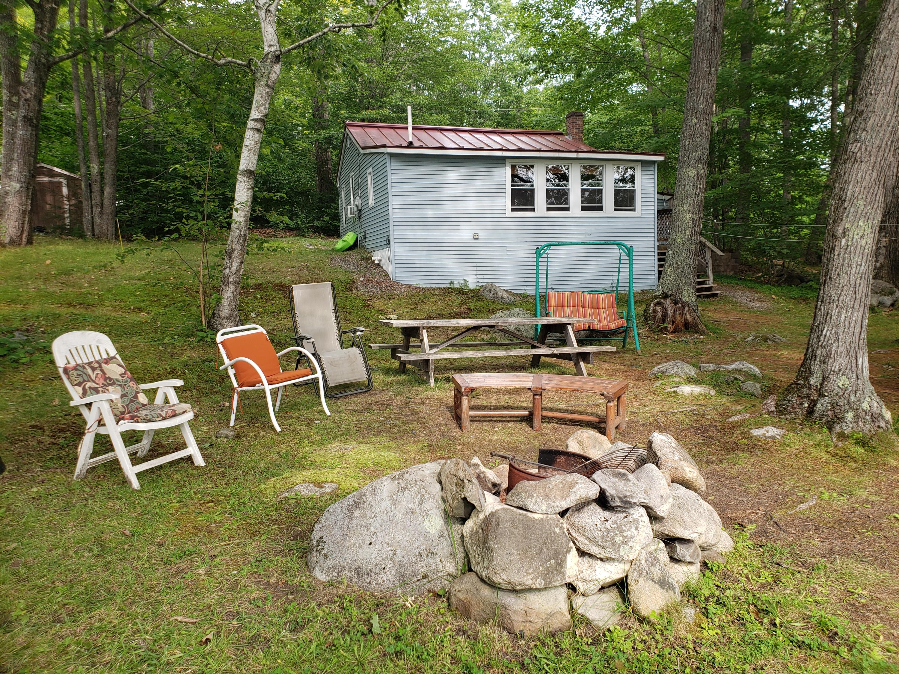 331 Sandy River Road Kents Hill, ME 04349 - Photo 9 of 23 Nothing beats a campfire!