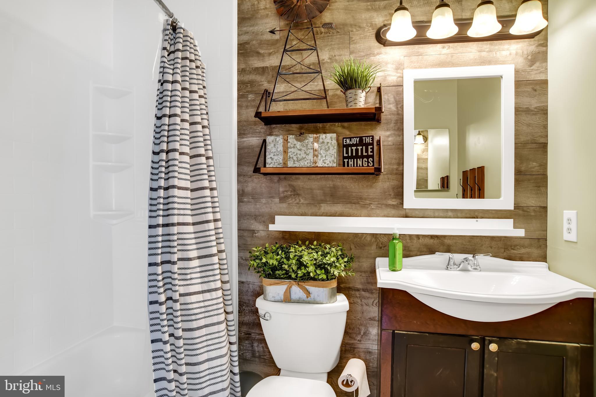 3442 Brookhaven Road Pasadena, MD 21122 - Photo 15 of 30 Master Bath by features ship lap accent wall!