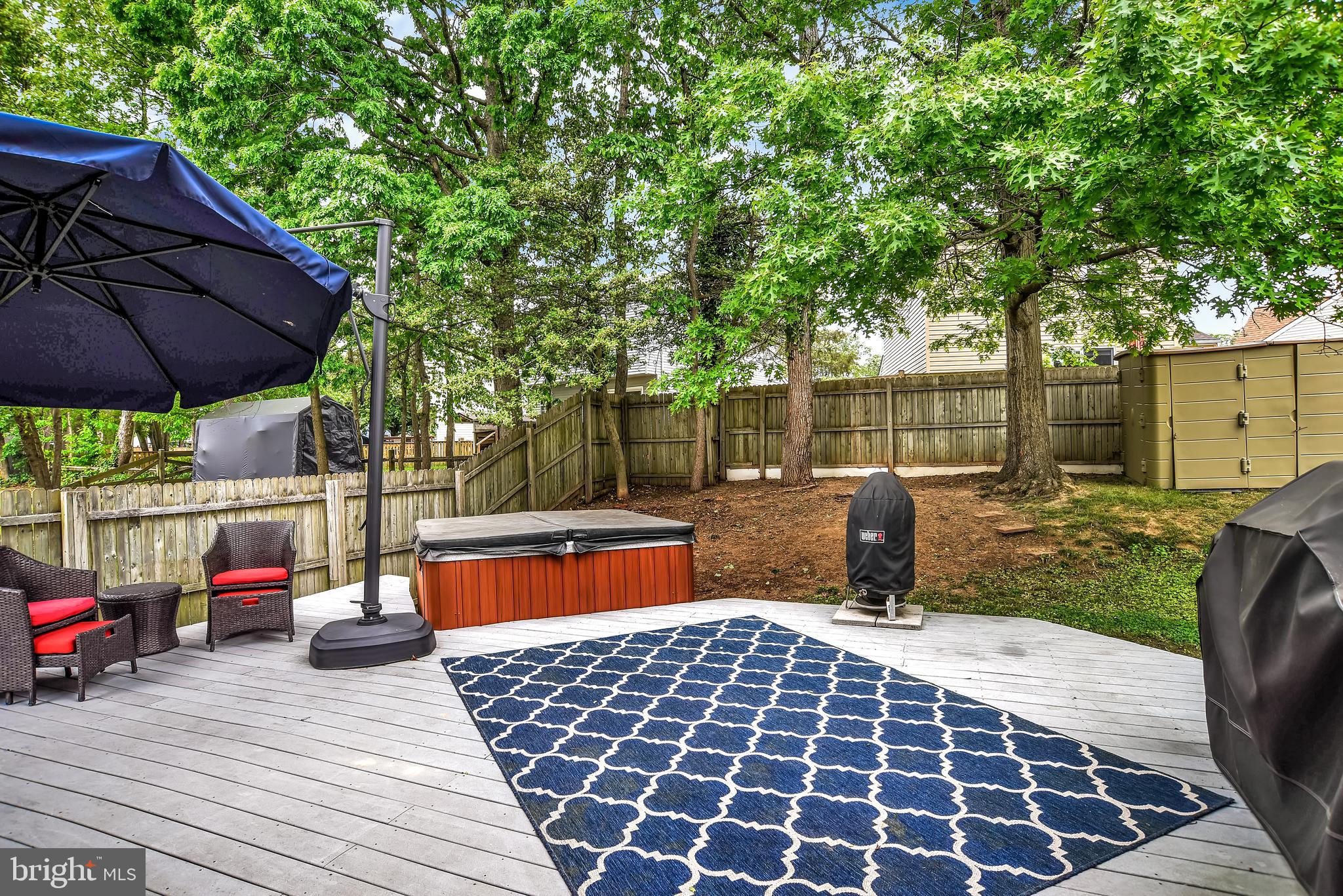 3442 Brookhaven Road Pasadena, MD 21122 - Photo 23 of 30 Fenced back yard with deck & hot tub!