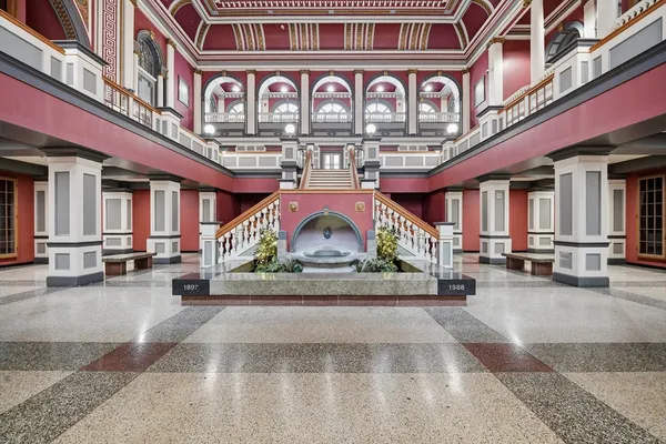 a view of a building with a lots of entrance gate