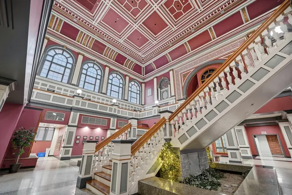 a view of balcony with furniture