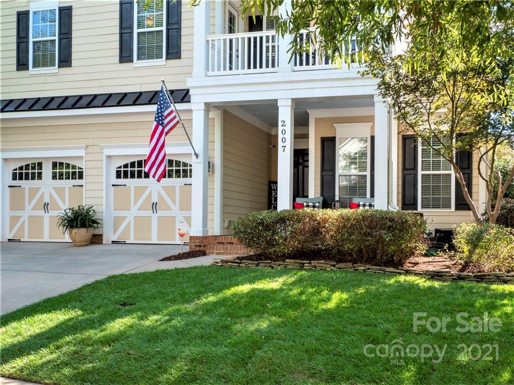 2007 Fallondale Road Waxhaw, NC 28173 - Photo 2 of 48 a view of a house with a small yard and flower plants