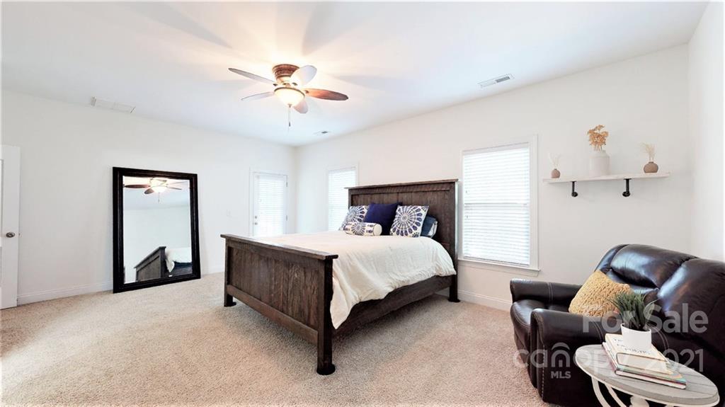 2007 Fallondale Road Waxhaw, NC 28173 - Photo 34 of 48 a bed room with a bed and a chair