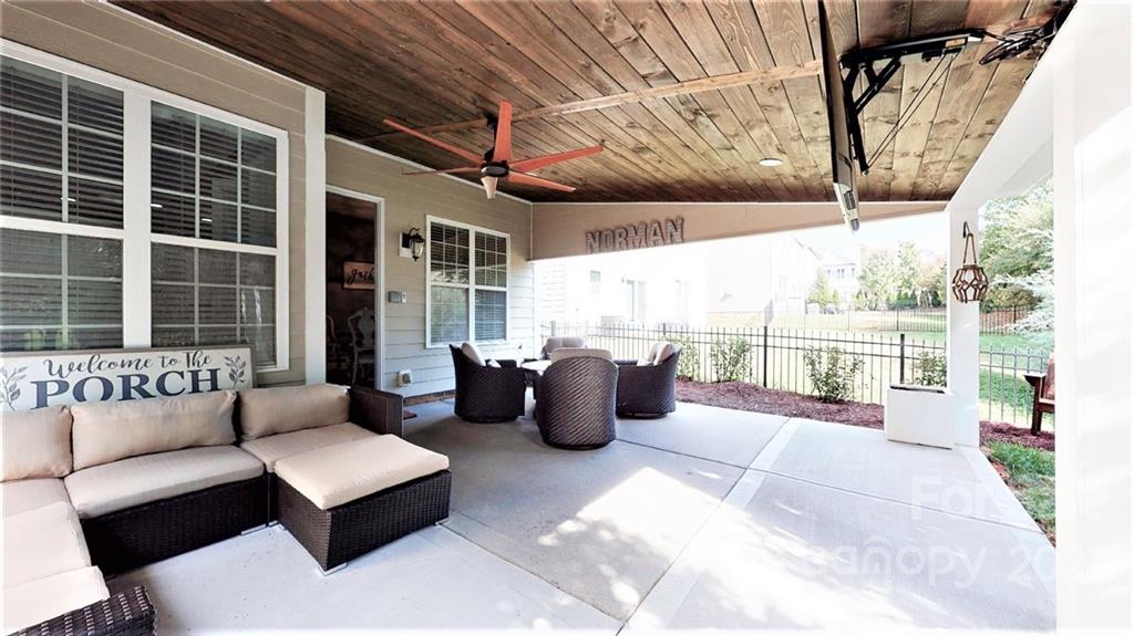 2007 Fallondale Road Waxhaw, NC 28173 - Photo 44 of 48 a balcony with furniture and a potted plant