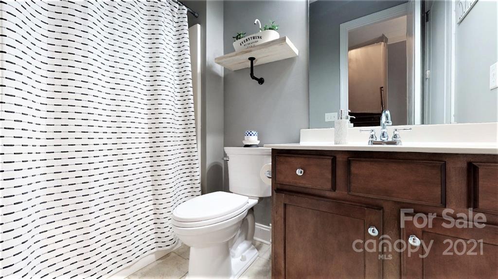 2007 Fallondale Road Waxhaw, NC 28173 - Photo 6 of 48 a bathroom with a sink a toilet and shower