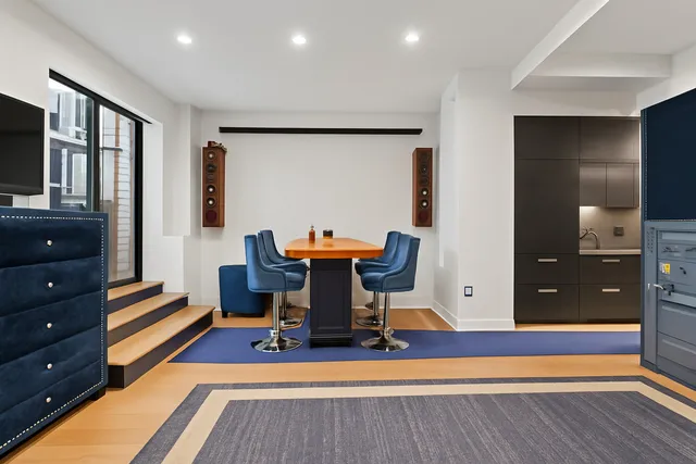 a bathroom with a toilet and a sink